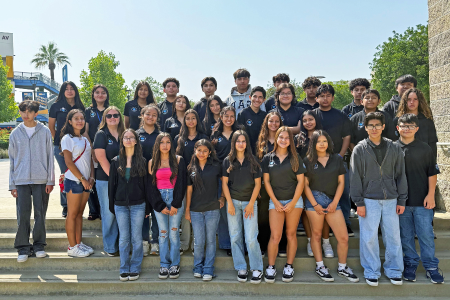 high school students pose together on outdoor steps during a Citrus College campus visit
