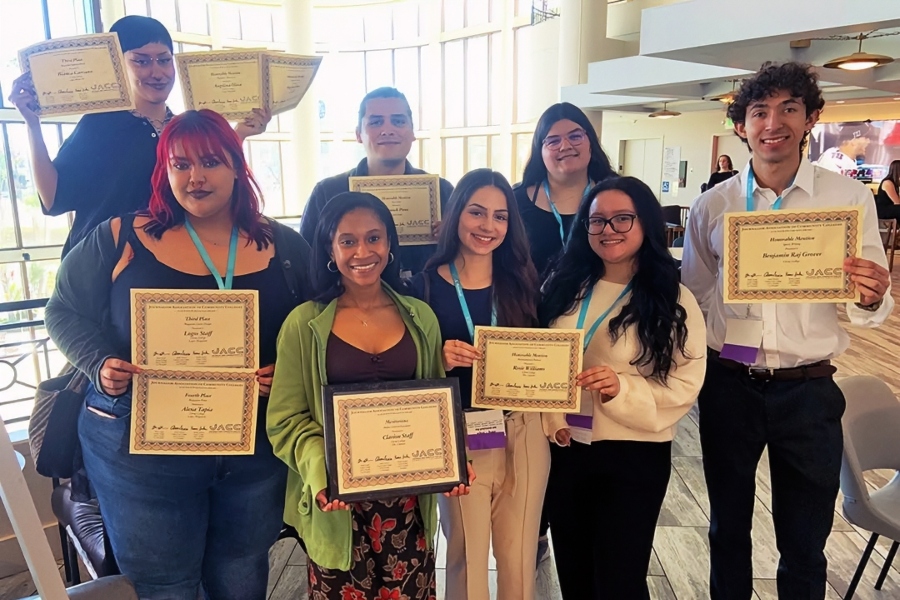 eight citrus college student journalists pose with certificates and awards from the journalism association of community colleges state convention in long beach