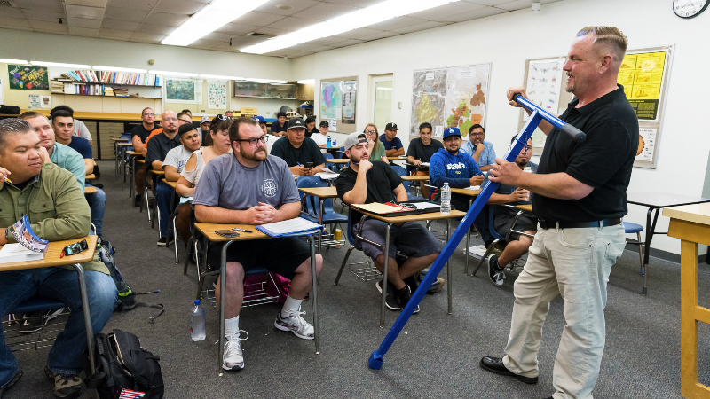 water tech instructor lecturing in front of a full class
