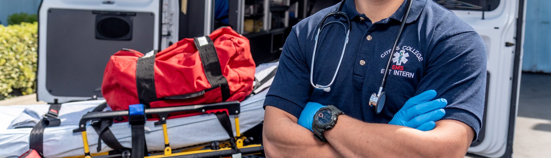 close-up of EMT student with medical equipment
