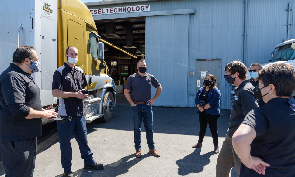 attendees standing outside the diesel technology building