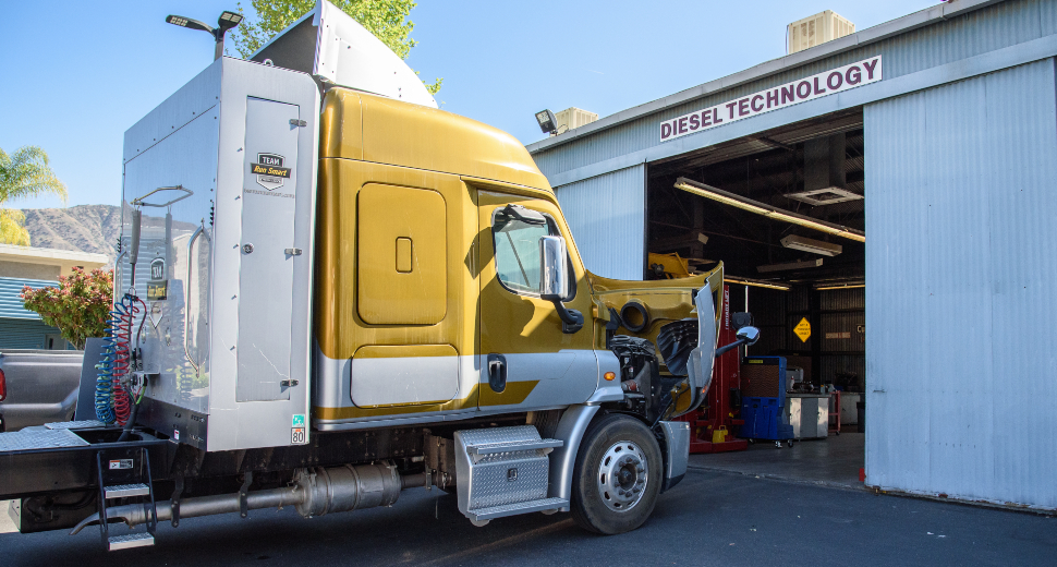 Freightline truck parked in front of the diesel technology building