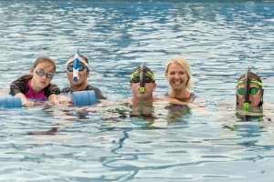 instructor with group with snorkles