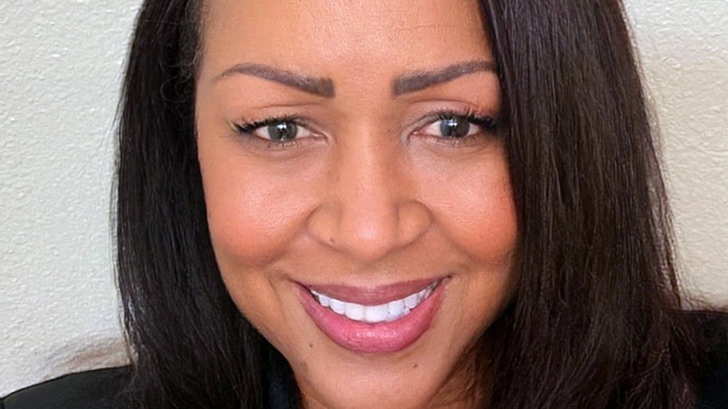 a close up head shot of Trustee Cheryl Alexander