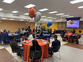 Superintendent/President Schulz addressing attendees at the spring 2022 conference held in the east wing of the Campus Center