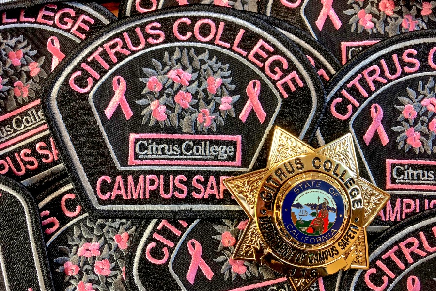 citrus college campus safety pink patches with breast cancer awareness ribbons surround a gold campus safety badge