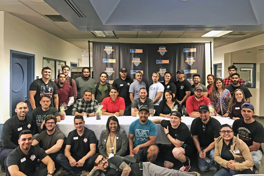 citrus college student veterans and staff pose together during a veterans success center gathering