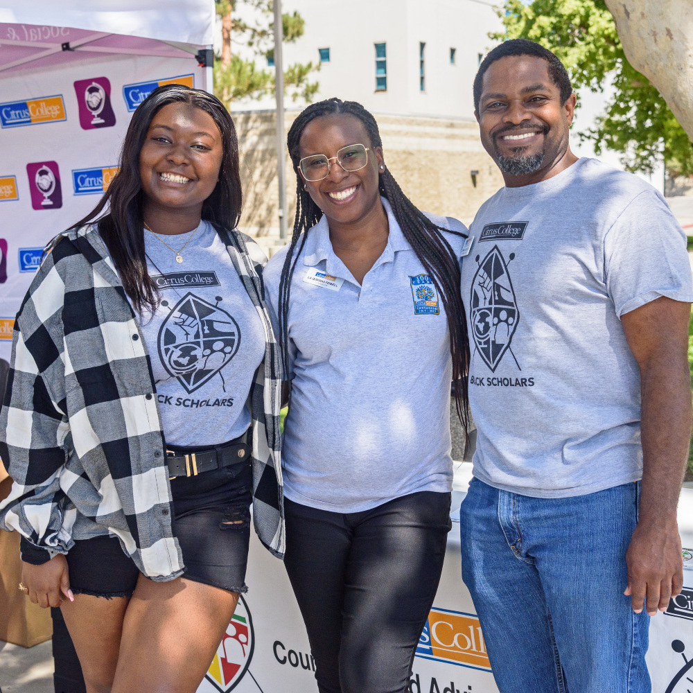 student jor'denay collier-brown with black scholars program co-advisors la quirshia fennell (left) and dominic jacquet (right)