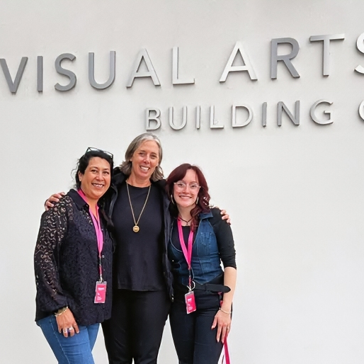 Marie-Andrée Chinchilla (right), Daniella Navarro (left) and Amanda Keller Konya (center) in front of Cal State Fullerton Visual Arts Building