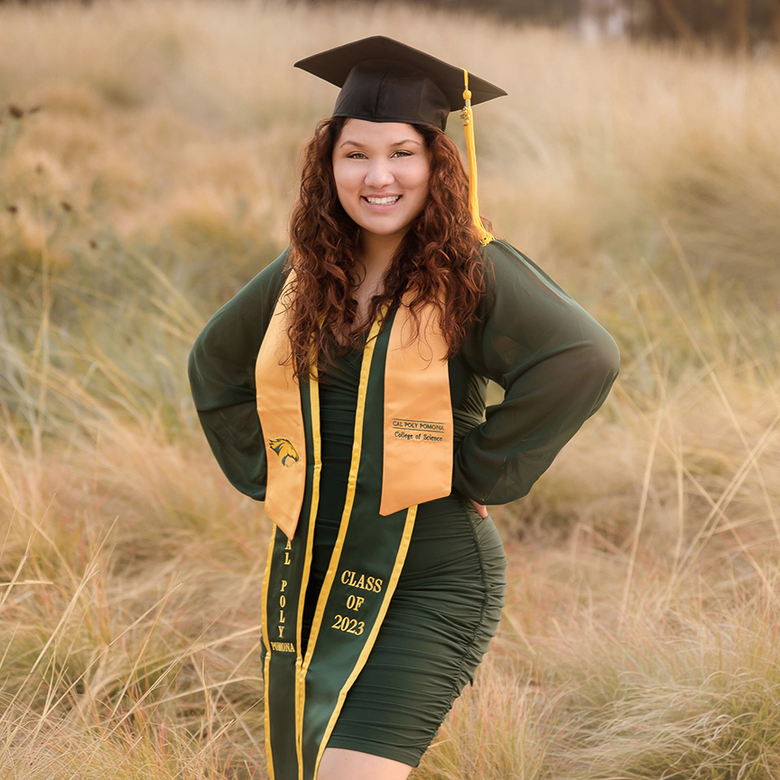 photo of Julia Martinez in a grad cap and weraing her Cal Poly Pomona 2023 sash