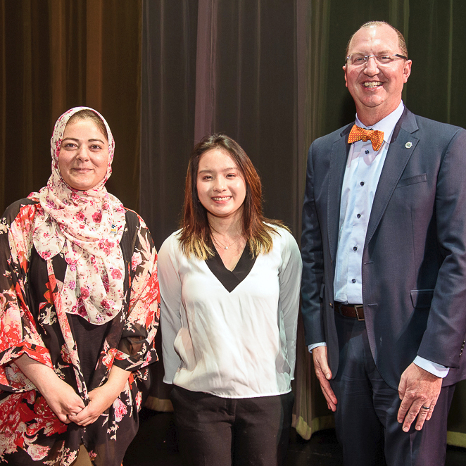 photo of Areej Qasqas, part-time faculty, Jessie San, and superintendent/president Greg Schulz