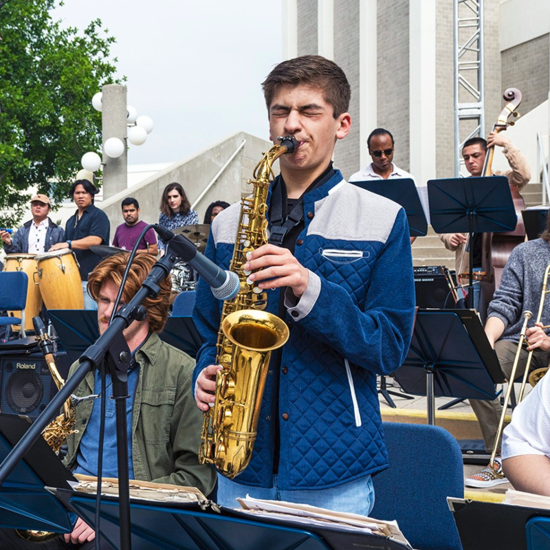 Nathan Palmer playing saxophone with the Blue Note Swing Orchestra